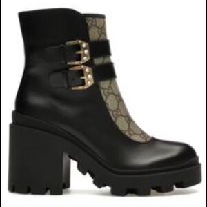 pair of Gucci shoes,